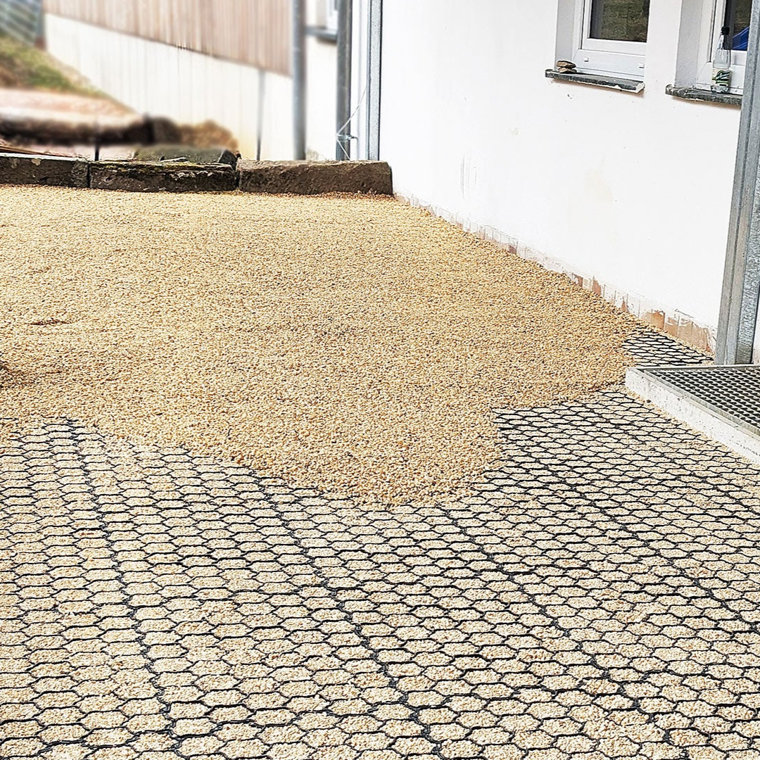 Terrasse befestigen mit Progrid und Kies